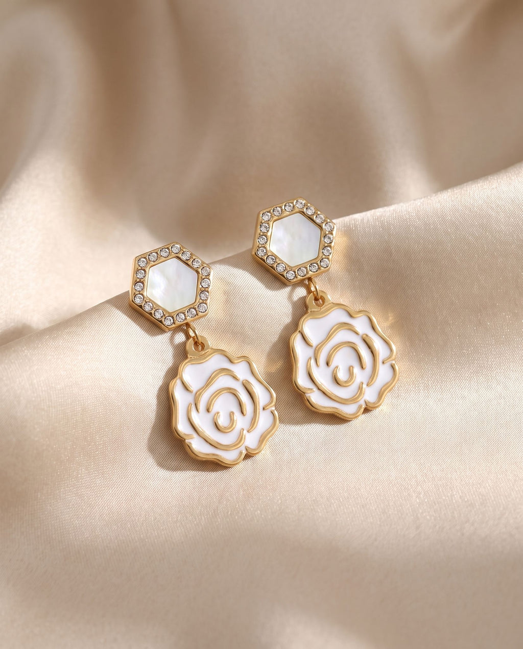 Boucles d'oreilles rose ajourée